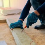 Glove-wearing,Asian,Workers,Are,Using,A,Fire,Barrier,Grade,Clutch