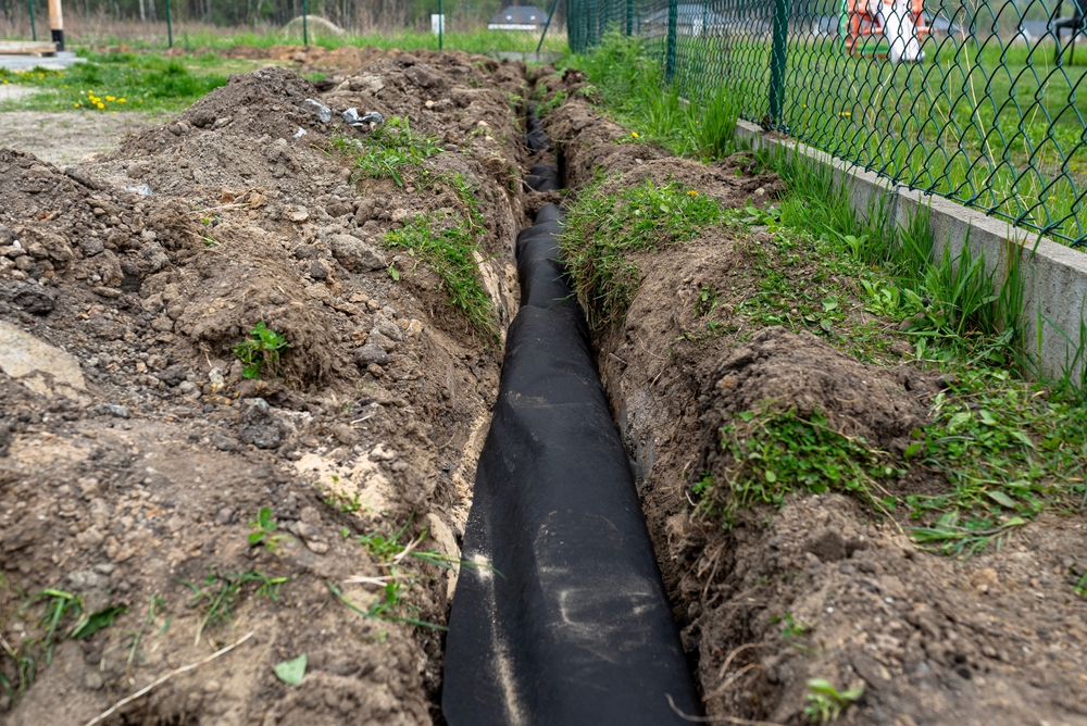 Drainage,Pipe,Wrapped,In,Geotextile,,Inserted,Into,A,Ditch,Dug